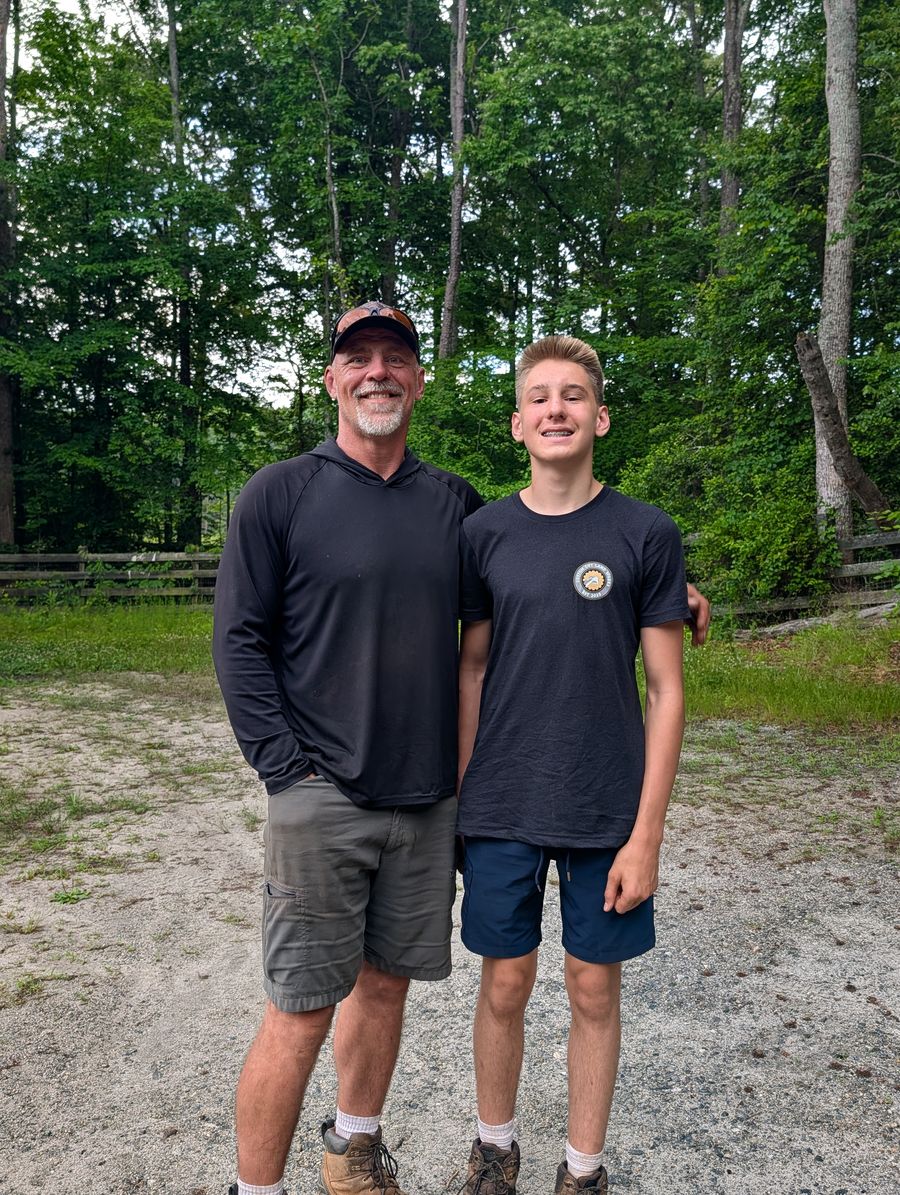 Brian Van Emmerik of Custom Cut Land Works with his son